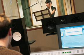 Voice over artist in recording studio